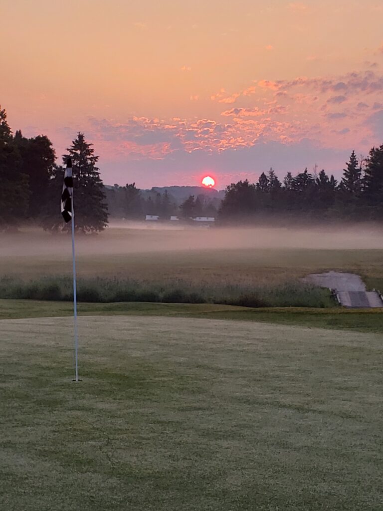 Golfer teeing off at Shanty Bay Golf Course near Barrie Ontario